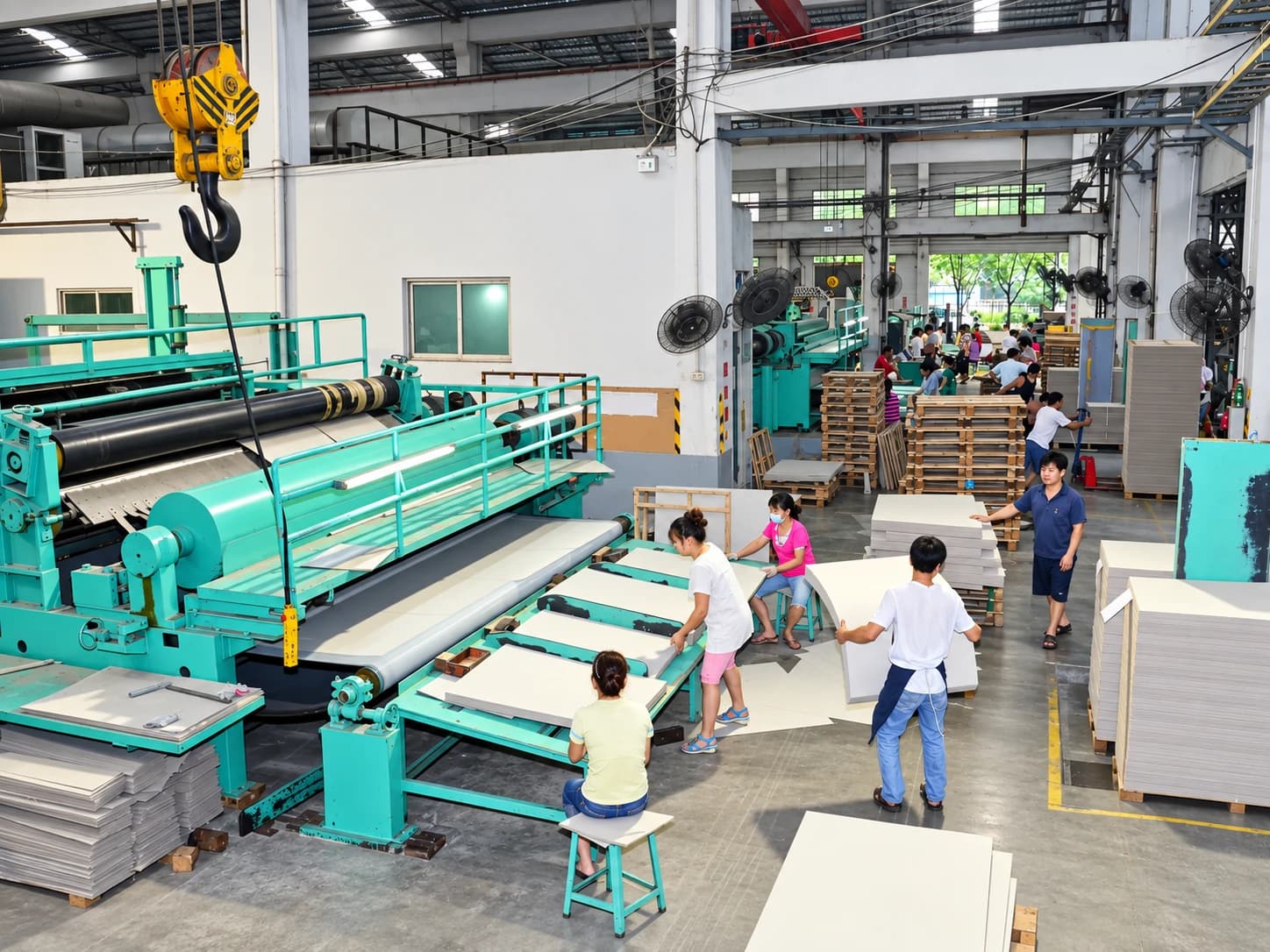 Grey board production equipment at the Dongguan base